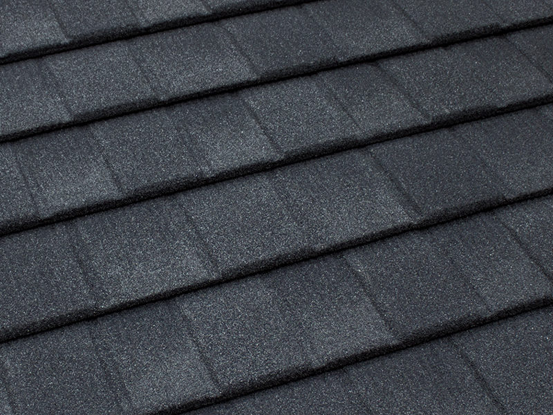 Close-up of Tilcor CF Shingle stone-coated steel panel in charcoal blend