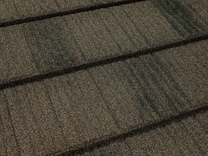 Close-up of Tilcor Craftsman Shake stone-coated steel panel with weathered-wood texture